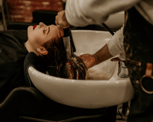 salon-person-getting-hair-washed